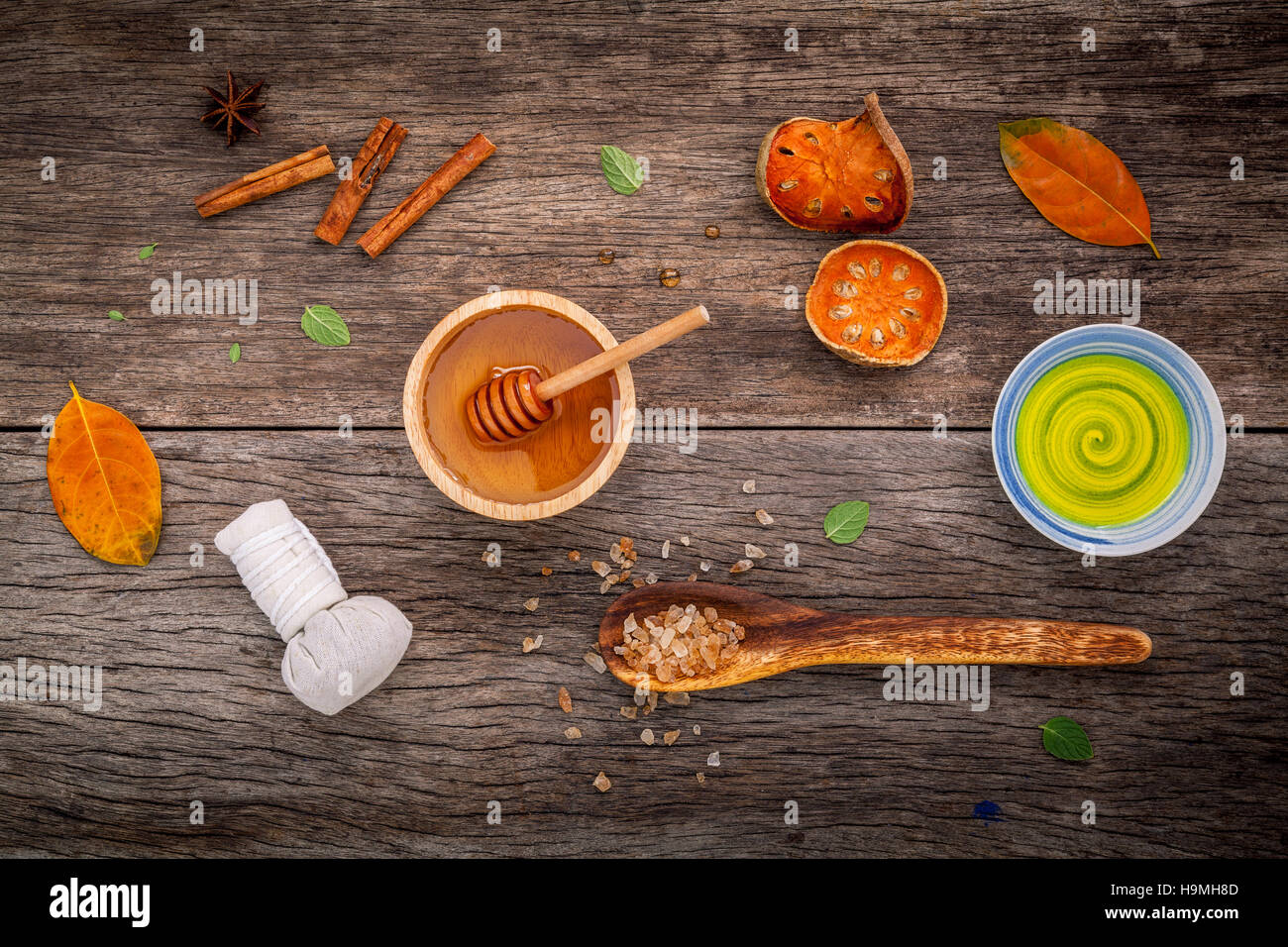 Composition of nature spa ingredients on the dark wooden table. Stock Photo