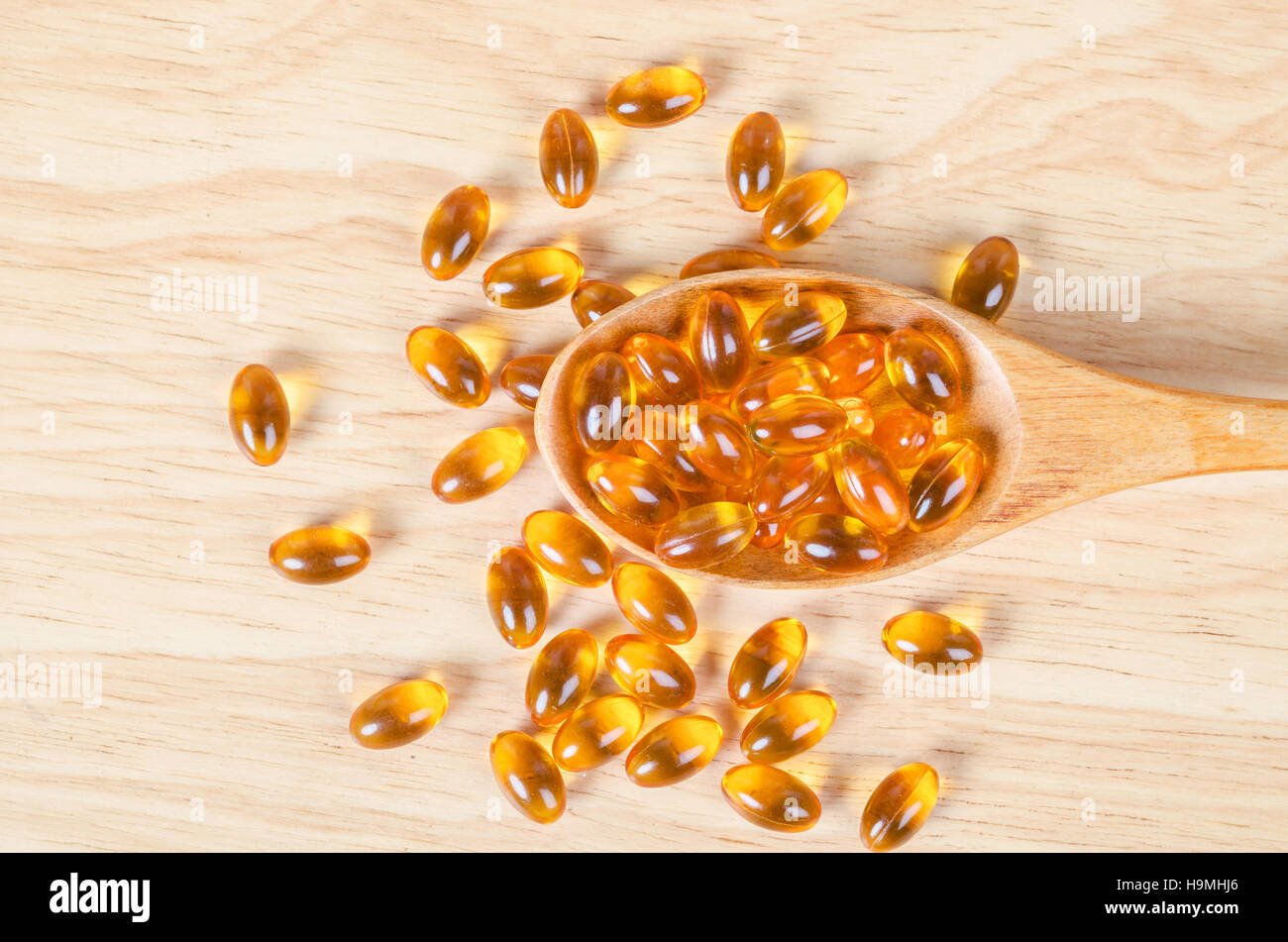 Fish oil capsules with omega 3 and vitamin D Stock Photo Alamy