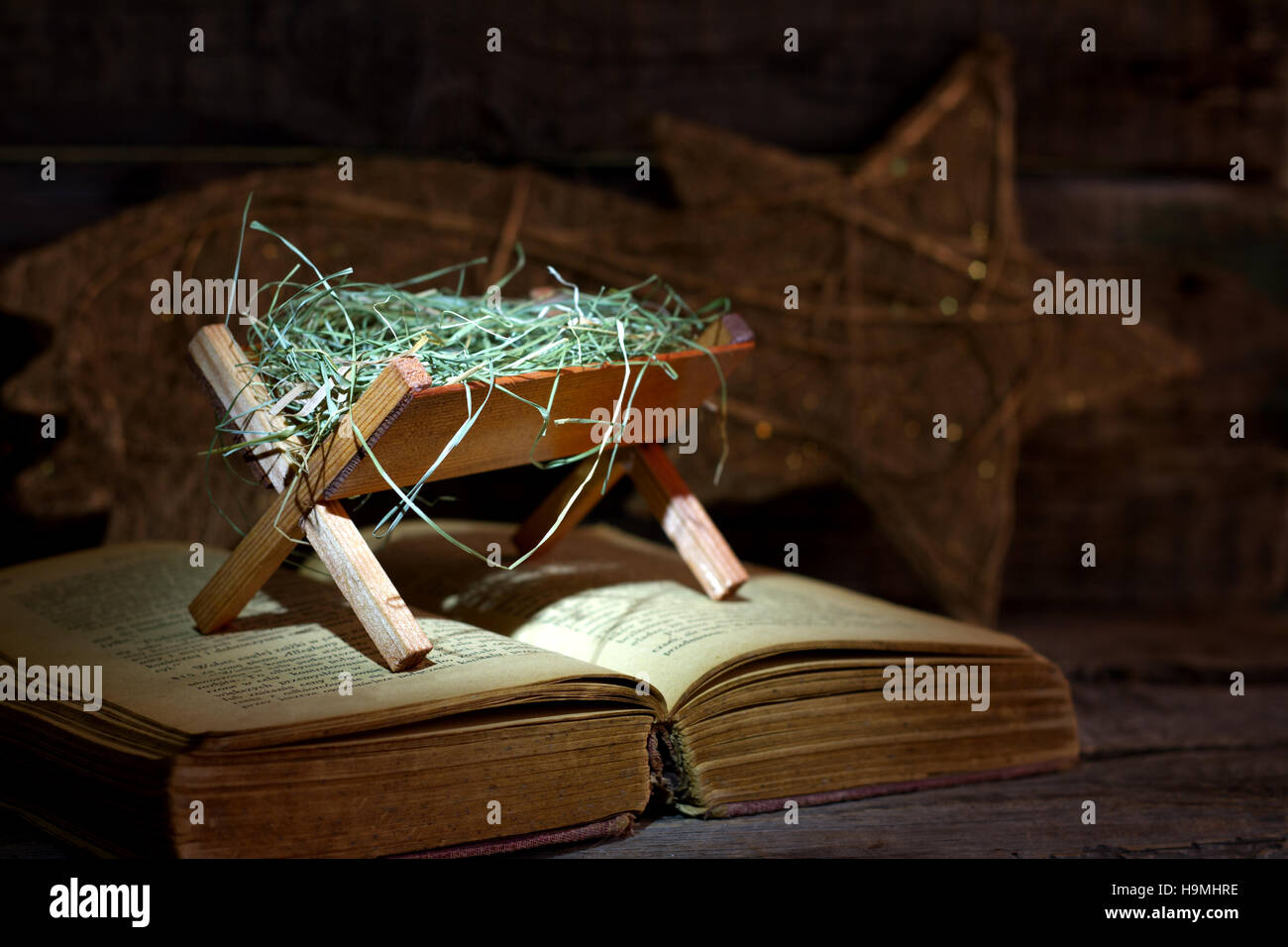 Birth of Jesus with manger on the bible abstract christmas symbol nativity scene Stock Photo Alamy