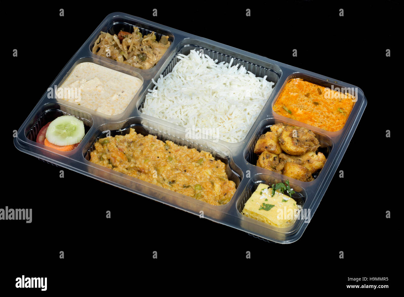 Rajasthani Thali packed in In lunch Box, Pune, India Stock Photo - Alamy