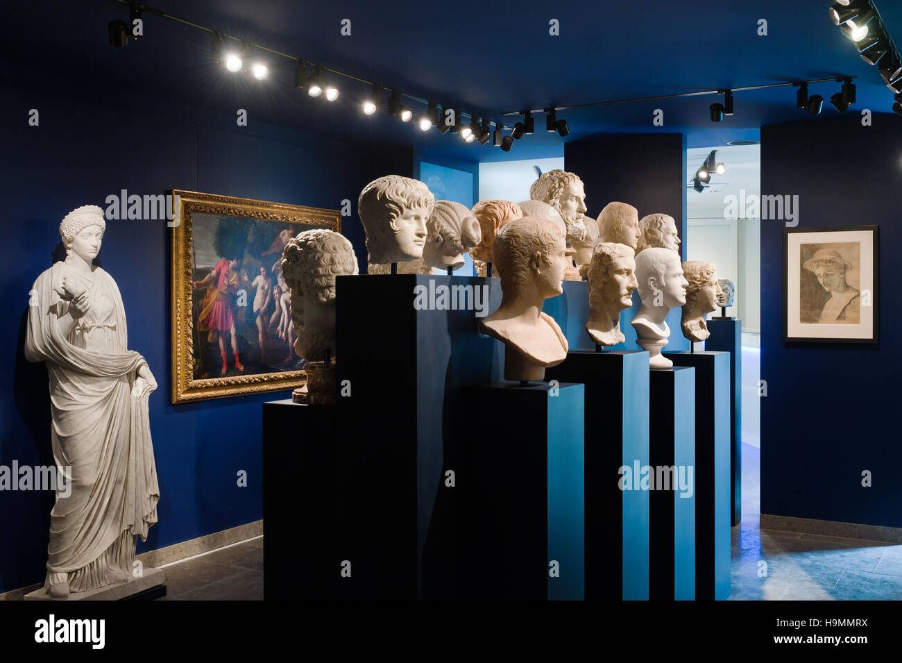 Collections of staues and bust on blue plinths in Mougins Museum of Classical Art, France Stock Photo