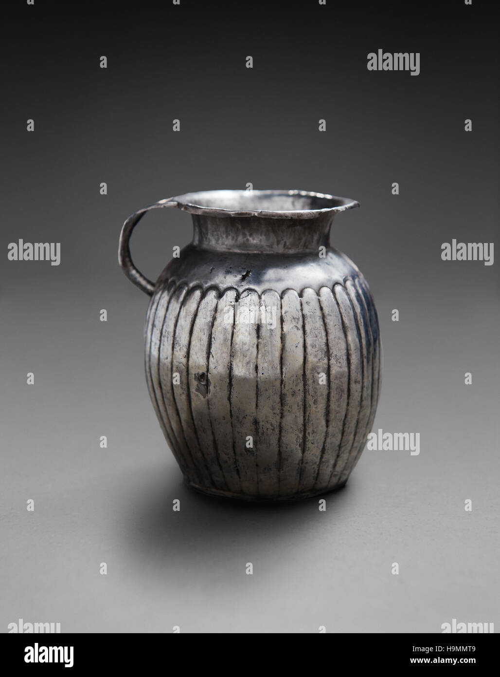 Pewter jug,  Museum of Antiquities, Mougins, France Stock Photo