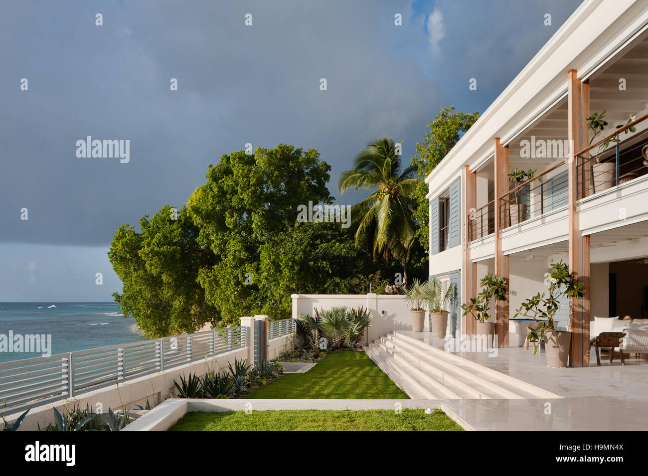 Open exterior of coastal luxury accommodation in the Caribbean, West Indies Stock Photo