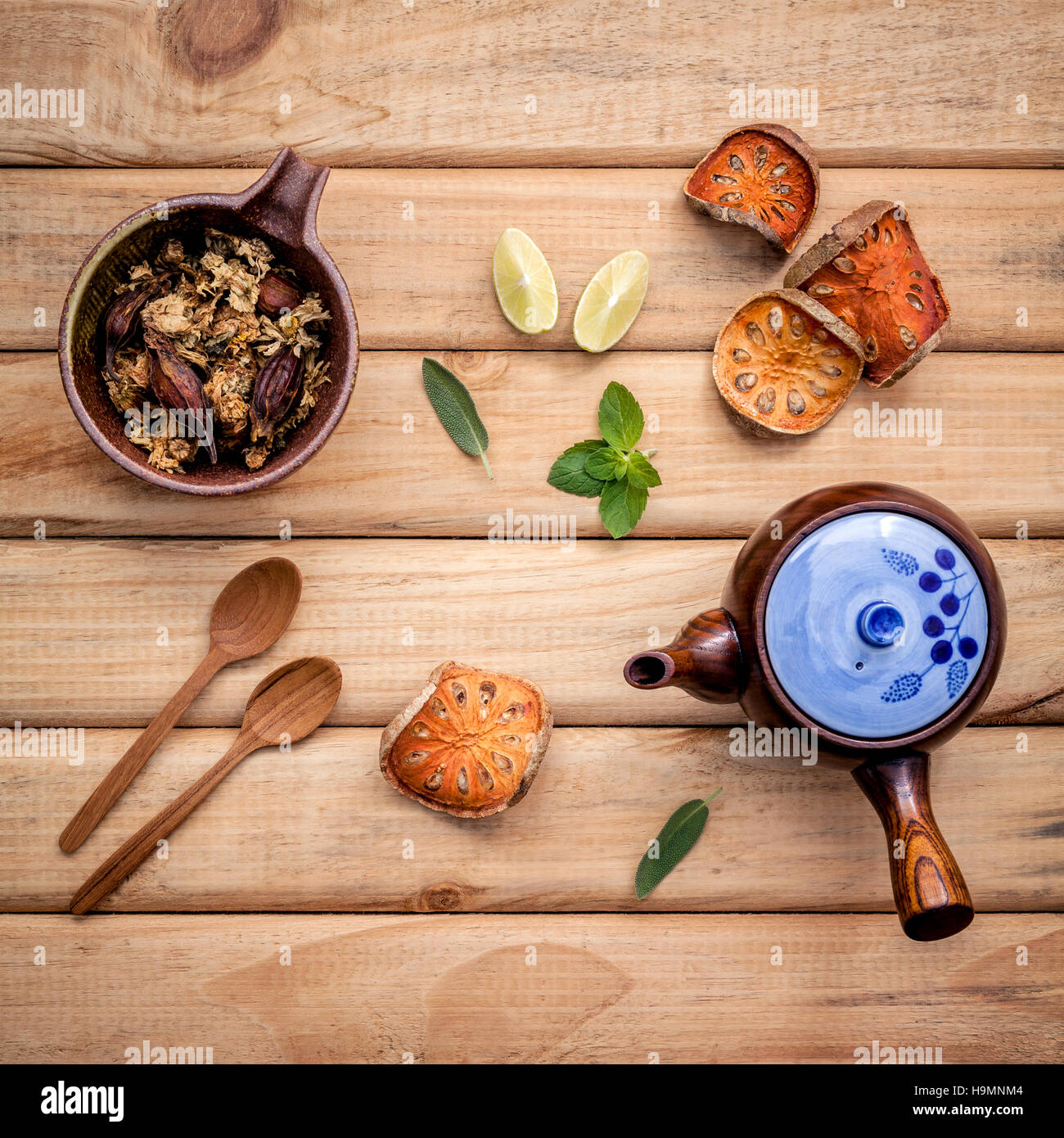 Herbal tea pot with fresh herbs sage ,peppermint ,dried indian b Stock Photo