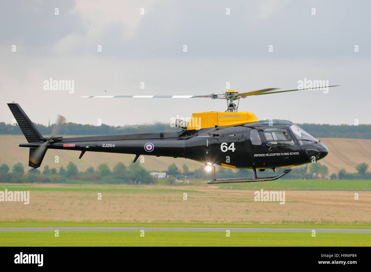 Eurocopter AS.350BB ZJ264 flying into Duxford during the annual Air Show Stock Photo