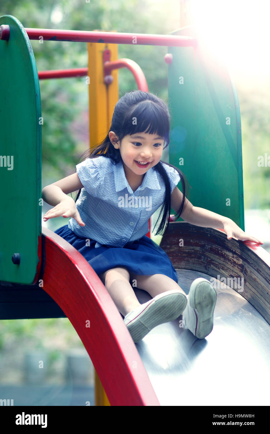 The little girl slide Stock Photo Alamy