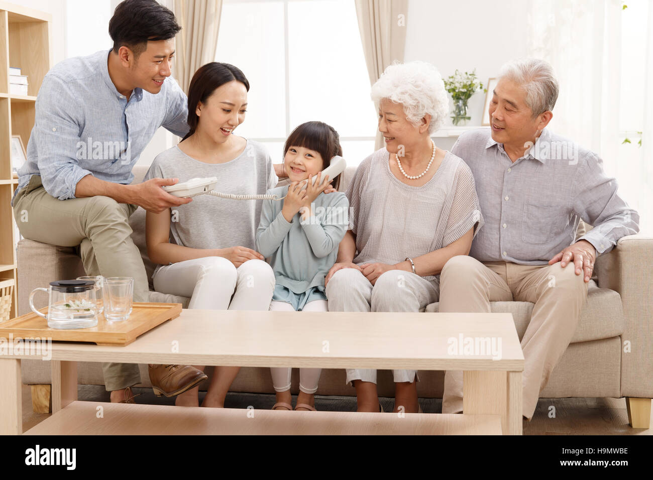 Happy family life Stock Photo - Alamy