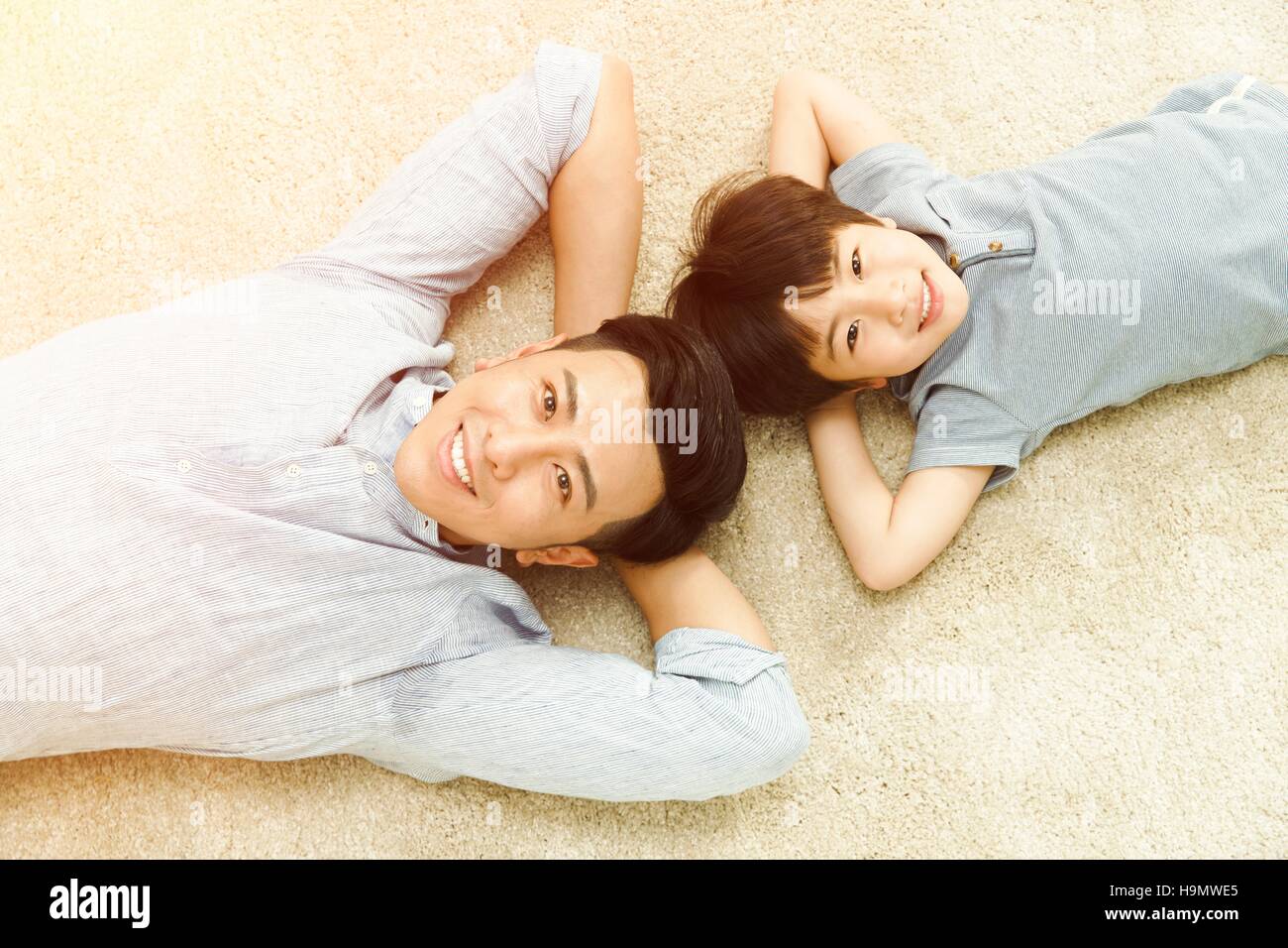 Indian father son back back hi-res stock photography and images - Alamy