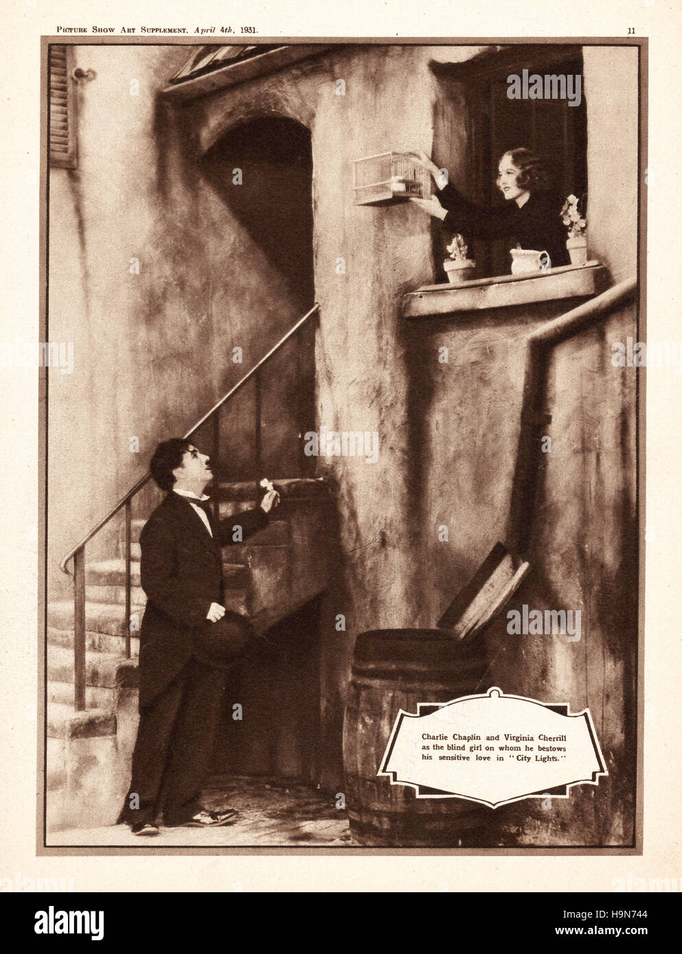 1931 Picture Show page 11 Charlie Chaplin and Virginia Cherrill in 'City Lights' Stock Photo