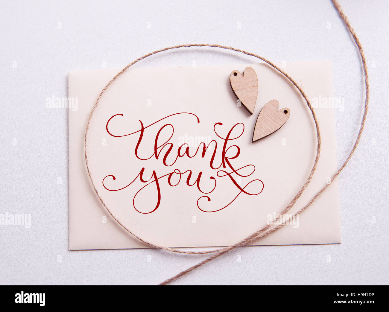 Valentines card with wooden heart and text Thank you Stock Photo