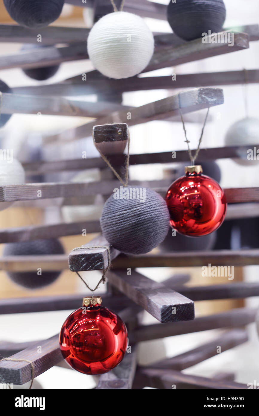 Modern wooden decorative Christmas tree with baubles Stock Photo Alamy