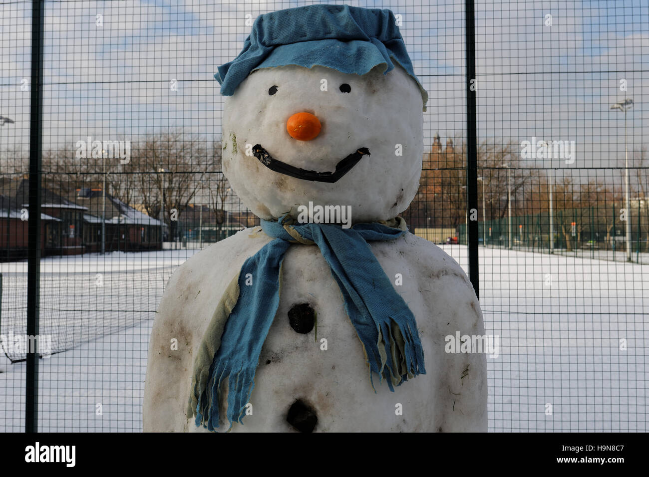 Classical snowman with hat scarf and carrot nose White Christmas Stock Photo