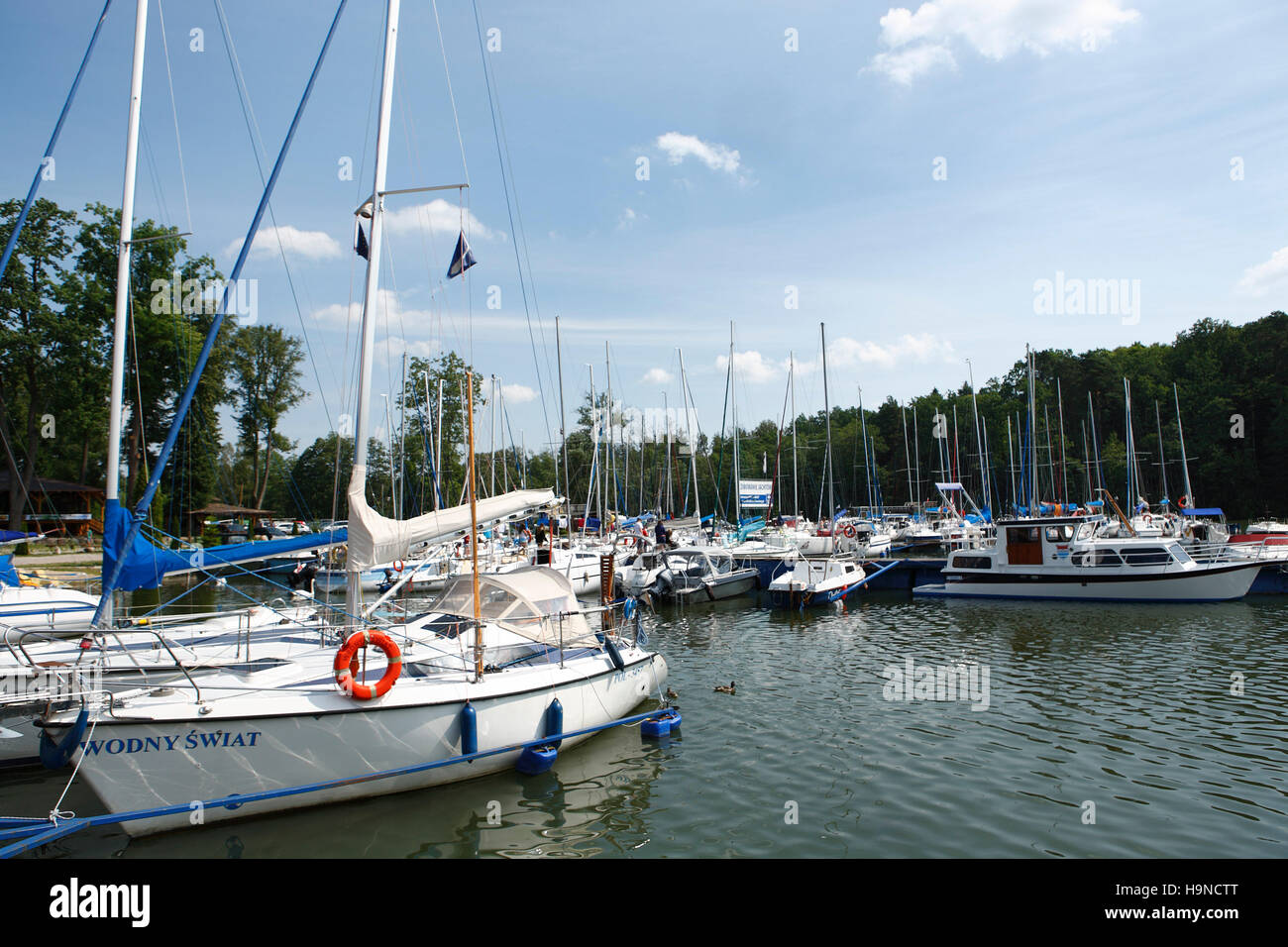 sailing boats in marina at nidzkie lake. ruciane-nida (rudczanny nieden), poland, europe Stock Photo