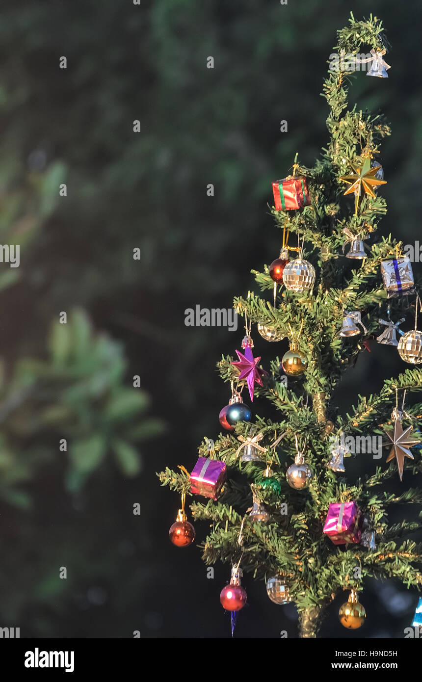 Christmas tree with gift boxes in a night Stock Photo Alamy