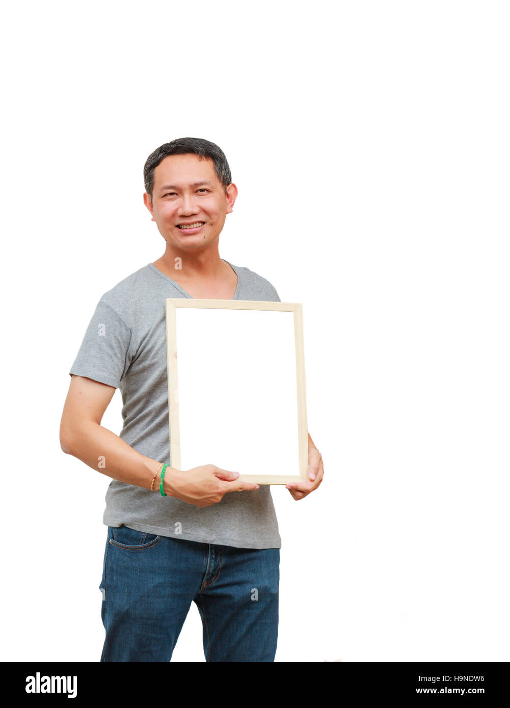 Asian thailand man middle age smile holding blank board, isolated on white background with copy space. Board with blank can add your text or others. c Stock Photo
