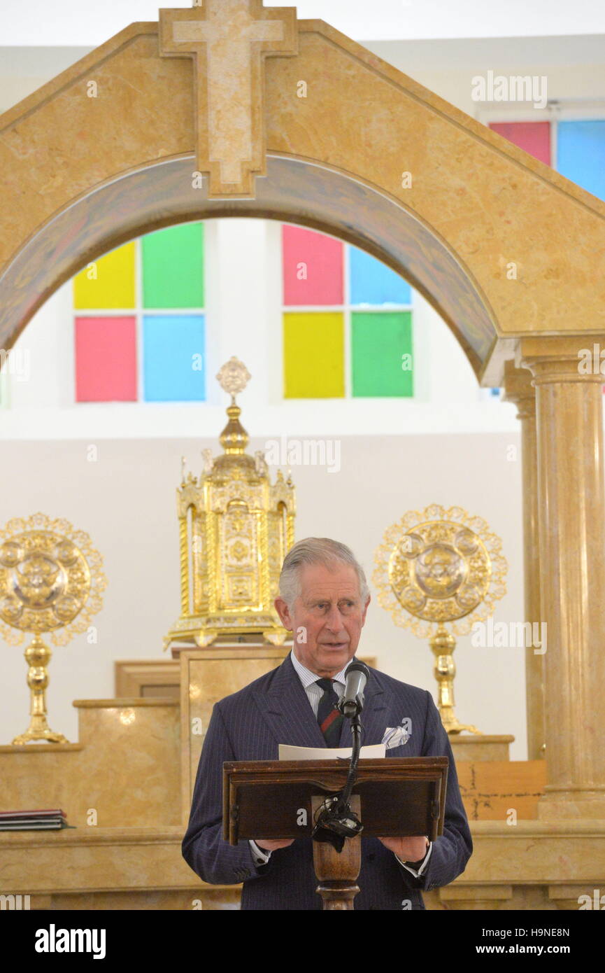The Prince of Wales reads from a lectern during the consecration of the new St Thomas Cathedral, Syriac Orthodox Church, in west London. Stock Photo
