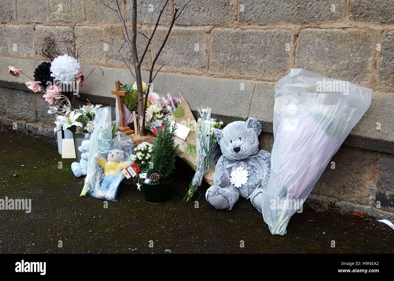 Tributes left at St Peters Church, Bramley, Leeds, where a newborn baby was found and pronounced dead soon after . Stock Photo