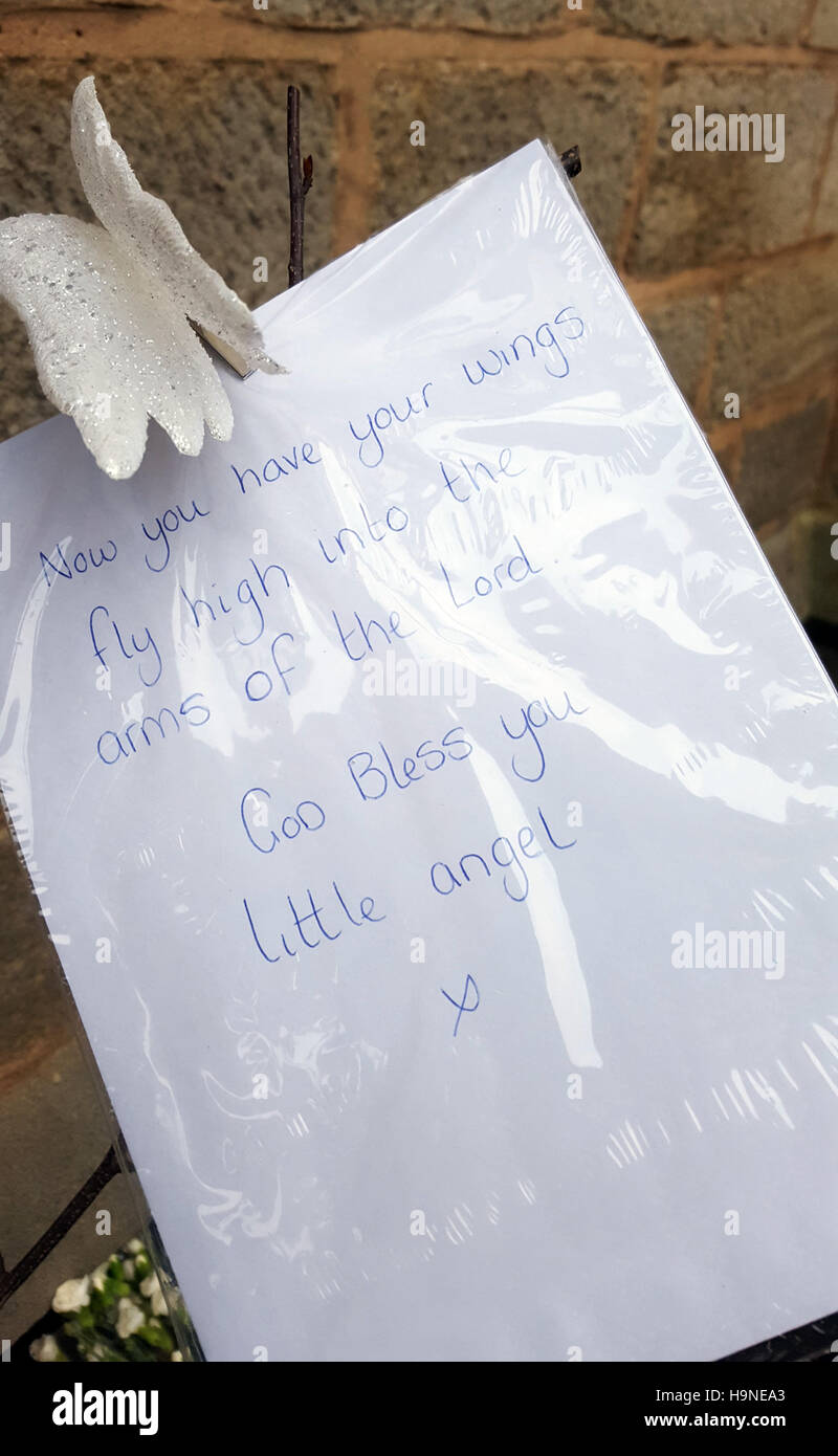 Tributes left at St Peters Church, Bramley, Leeds, where a newborn baby was found and pronounced dead soon after . Stock Photo