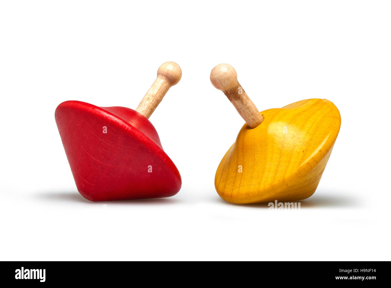 Two wooden and colorful spinning tops Isolated on white Stock Photo Alamy