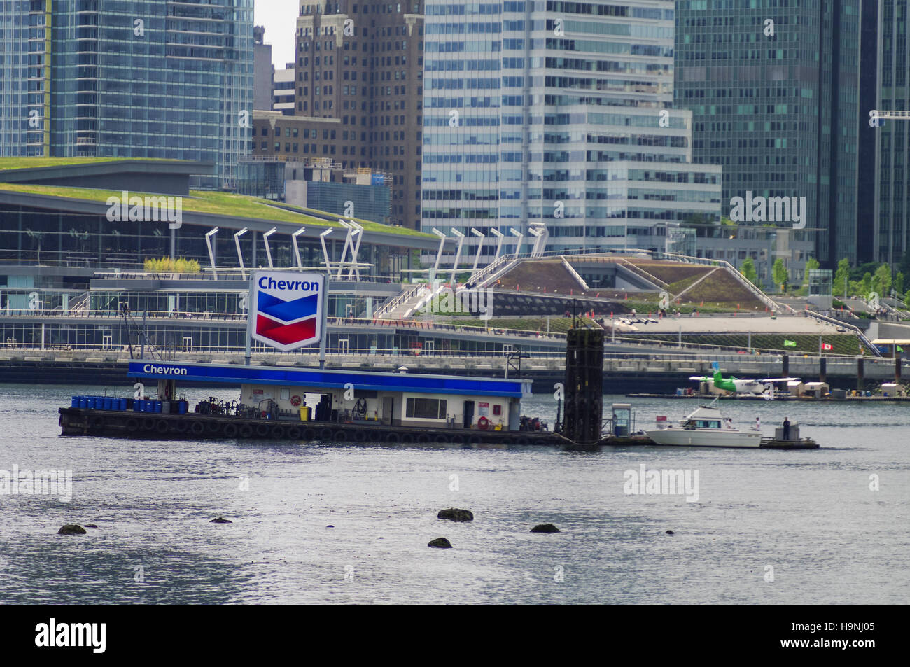 Chevron gas station on a barge in the harbor of Vancouver, British Columbia, Canada. Stock Photo