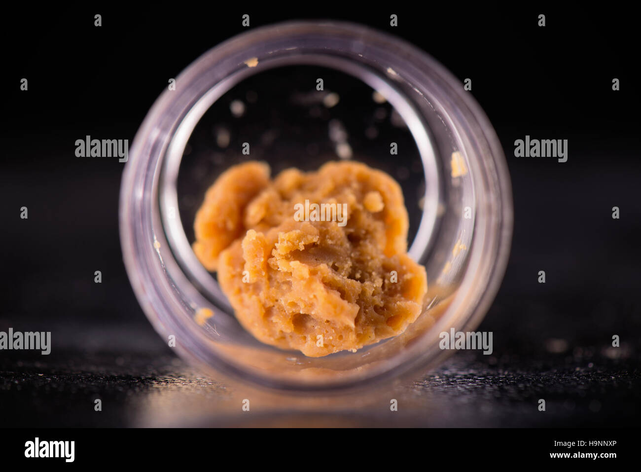 Marijuana extraction concentrate aka wax crumble isolated on black background Stock Photo