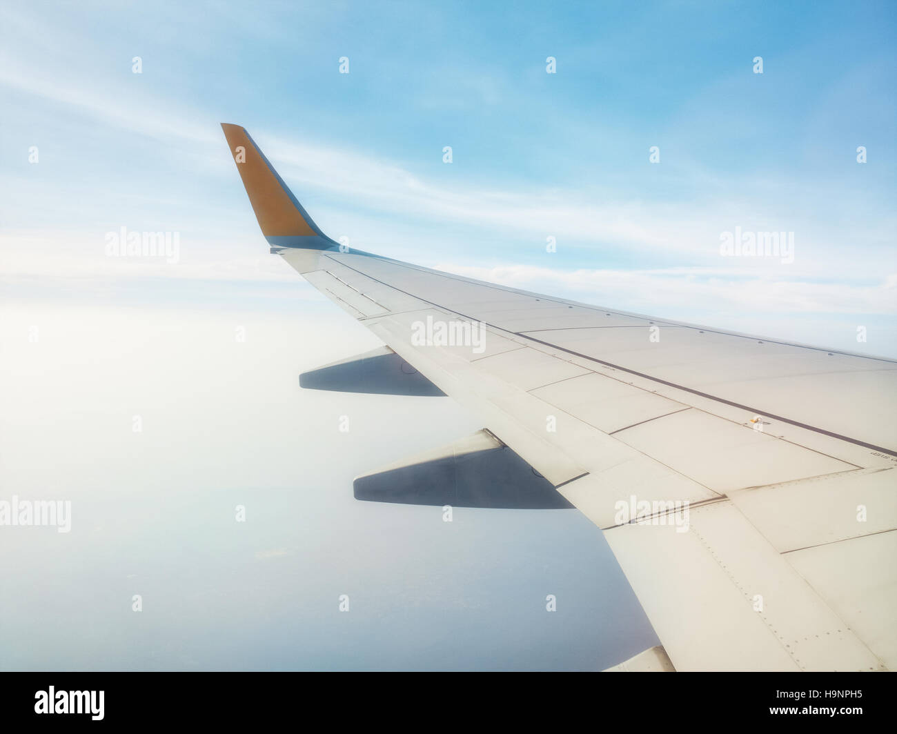 Airplane in the air, Soft focus. Stock Photo