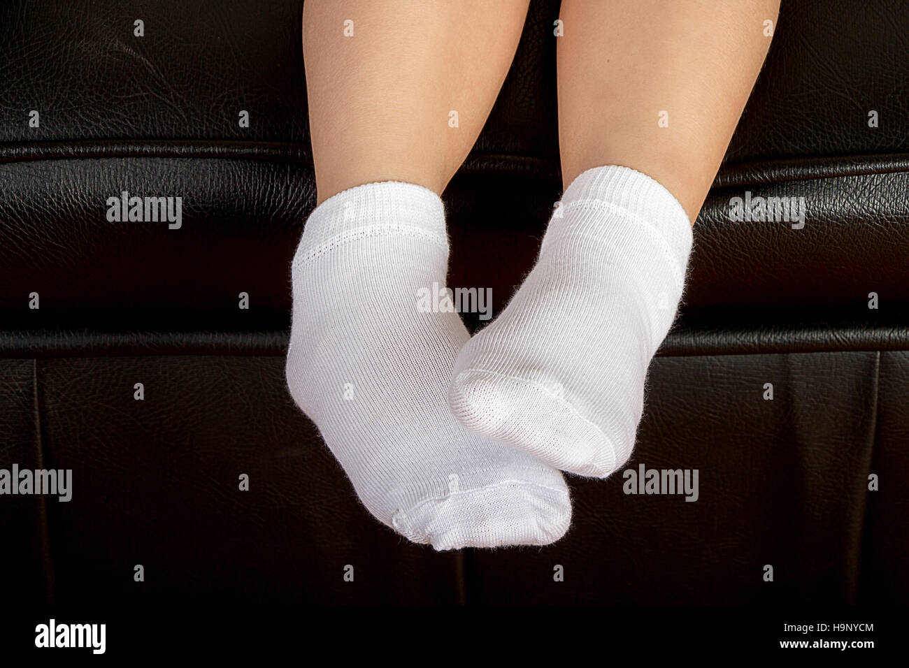 Young School Girl Student Feet Wearing White Socks Stock Photo