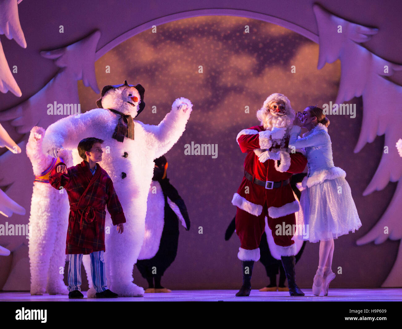 London, UK. 23 November 2016. L-R: Cameron Sutherland (Boy), Martin Fenton (Snowman), Federico Casadei (Father Christmas) and Caroline Crawley (Ice Princess). The Snowman returns to The Peacock theatre for the Christmas season and runs from 23 November 2016 to 1 January 2017. Based on the book by Raymond Briggs and the film directed by Dianne Jackson, the show tells the story of a young boy's adventures when his snowman comes to life on Christmas Eve. With Martin Fenton as Snowman and Cameron Sutherland as Boy. Stock Photo