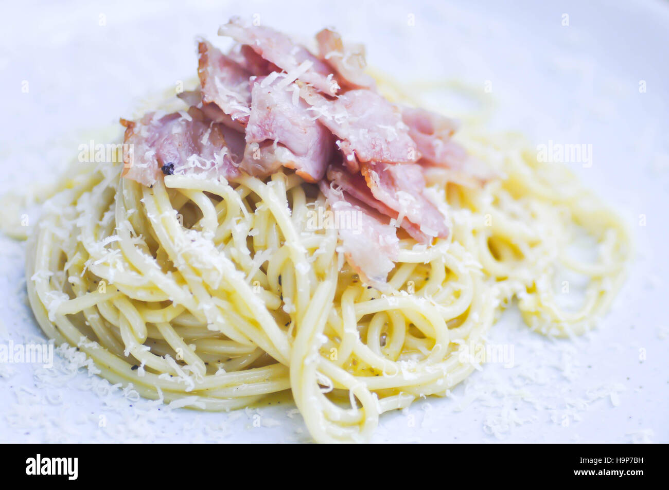 Pasta carbonara or Spaghetti with bacon and parmesan cheese Stock Photo