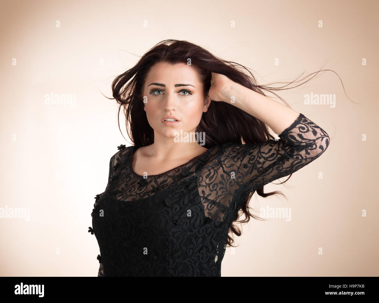 Beauty portrait of young healthy woman with hair blowing Stock Photo