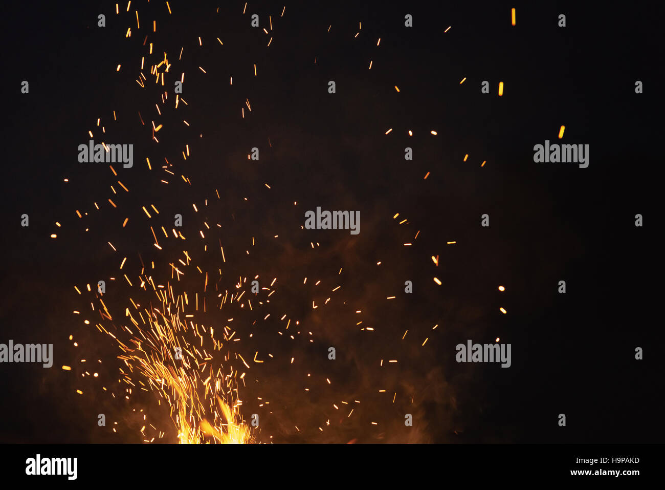 bonfire spark in the dark sky in night Stock Photo Alamy