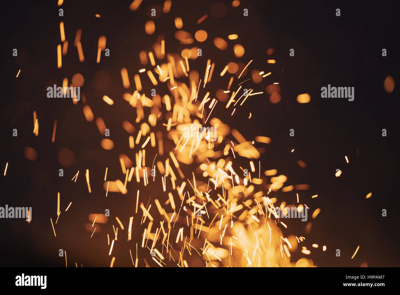 bonfire spark in the dark sky in night Stock Photo - Alamy