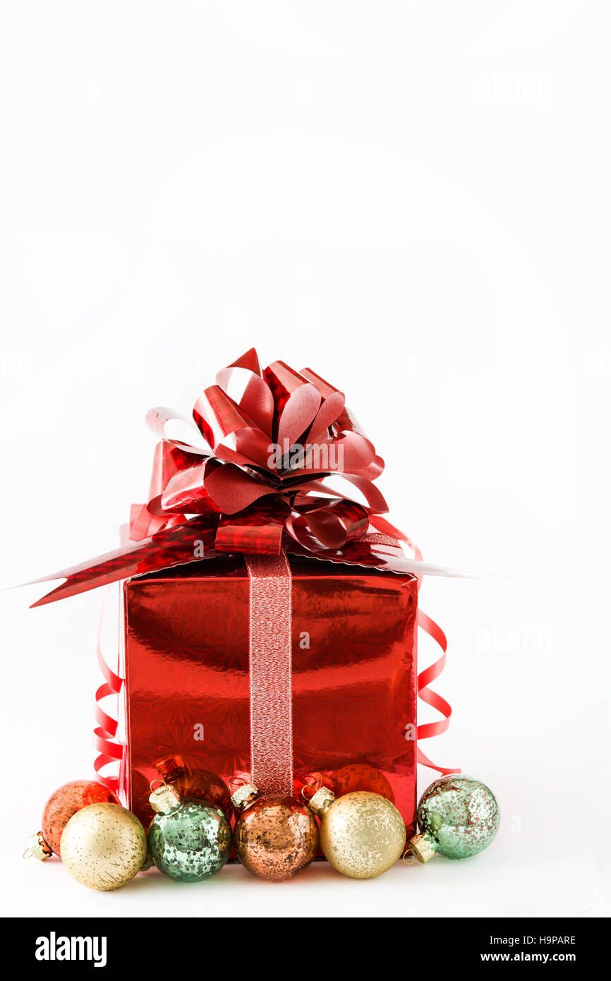 Red gift box and Christmas balls isolated on white background Stock ...