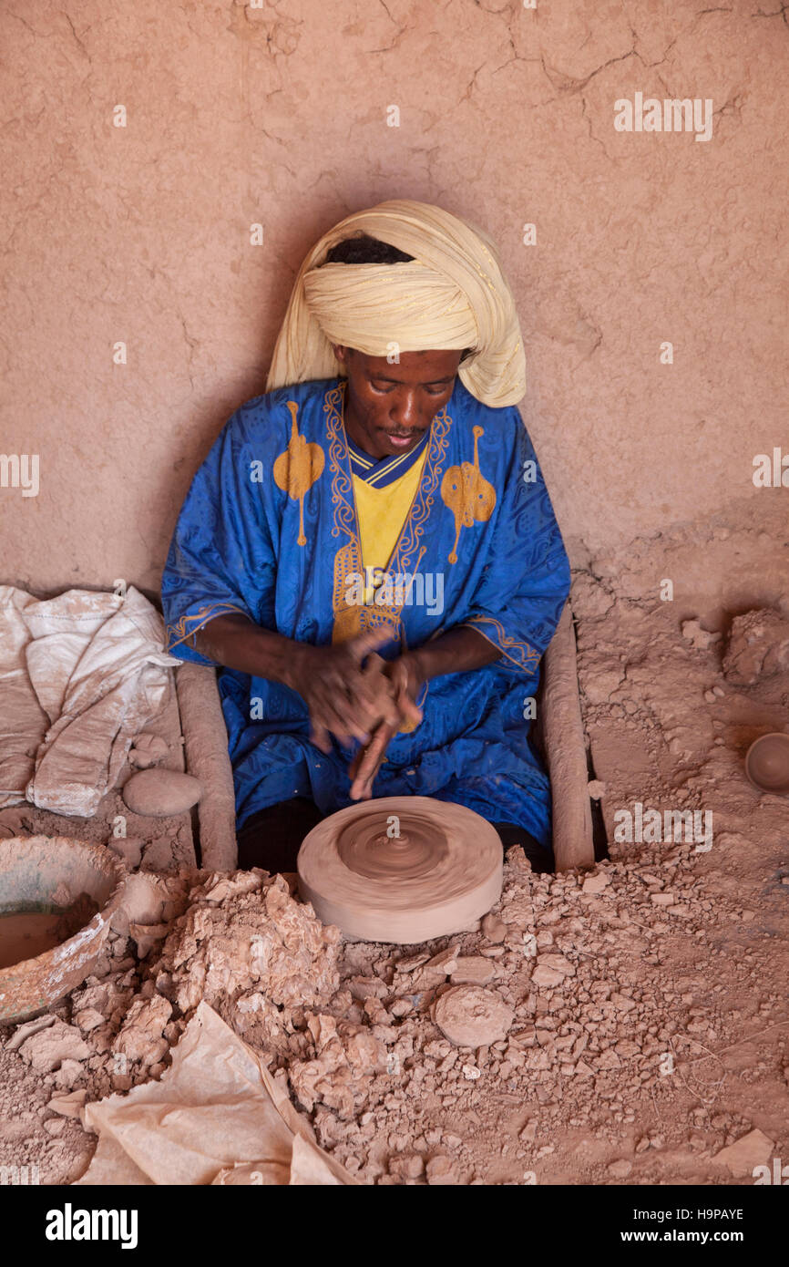 Arabian potter with spinning pottery wheel in Tamegroute. Stock Photo