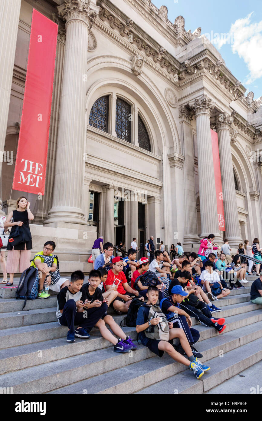 New York City,NY NYC Manhattan,Upper East Side,Fifth Avenue,Metropolitan Museum of Art,Met,front,exterior,main entrance,steps stairs staircase,Asian t Stock Photo