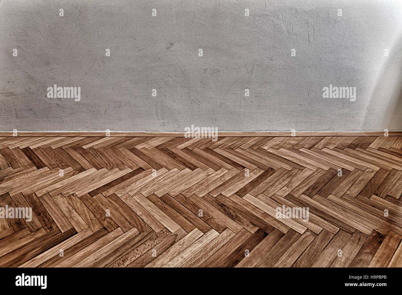 parquet floor and grunge wall Stock Photo