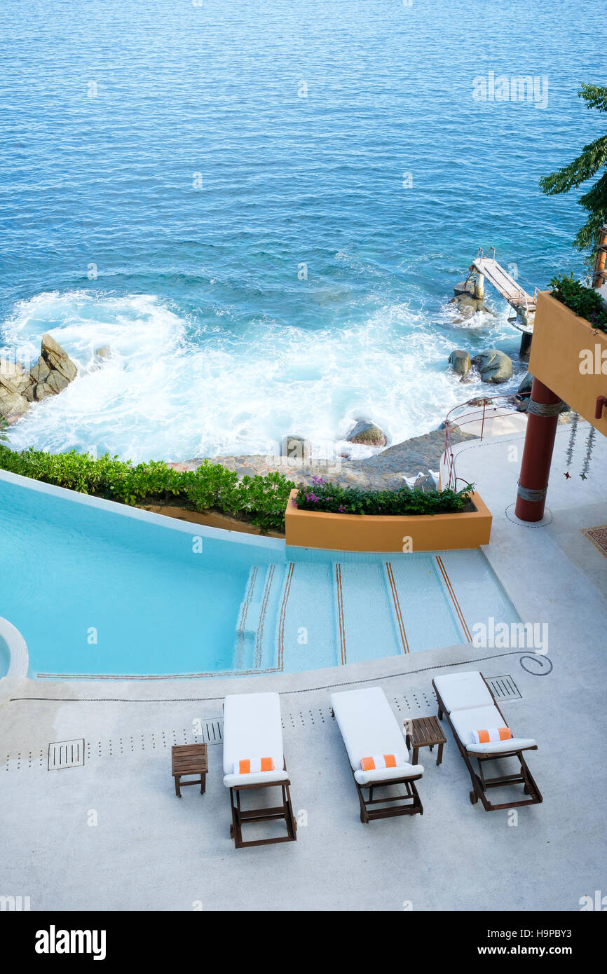 Ocen front property terrace with infinity swimming pool, view from above. Puerto Vallarta South Shore, Jalisco, Mexico Stock Photo