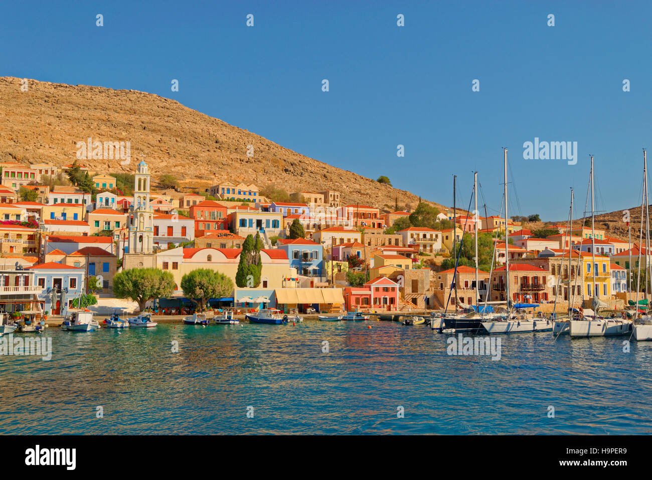 Chalki town on the Greek island of Chalki situated off the north coast of Rhodes in the Dodecanese Island group, Greece. Stock Photo