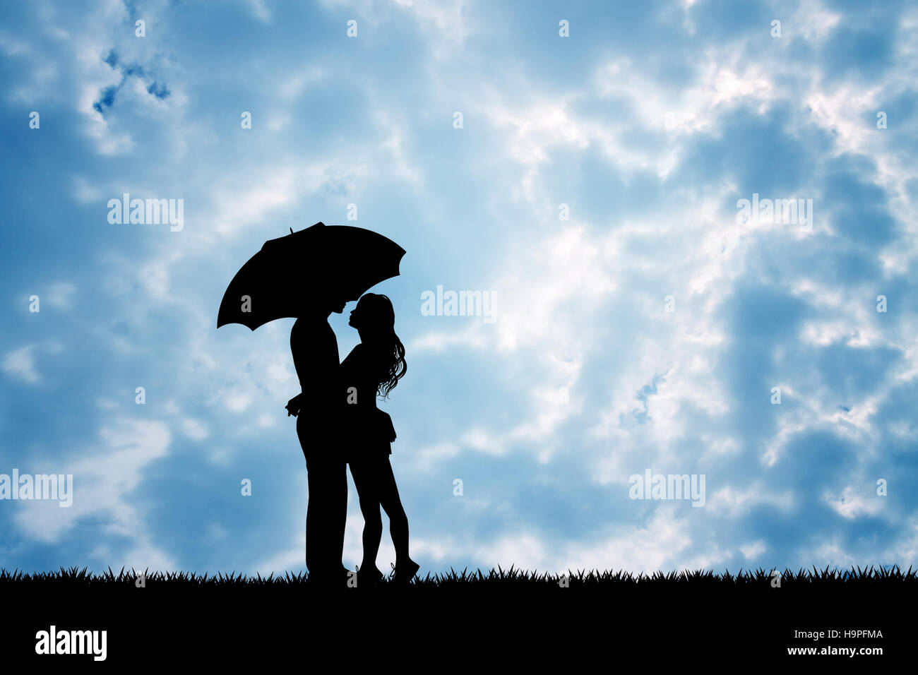 couple with umbrella in the rain Stock Photo - Alamy