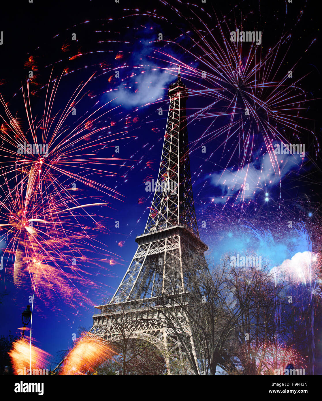 Eiffel tower with fireworks, celebration of the New Year in Paris, France Stock Photo