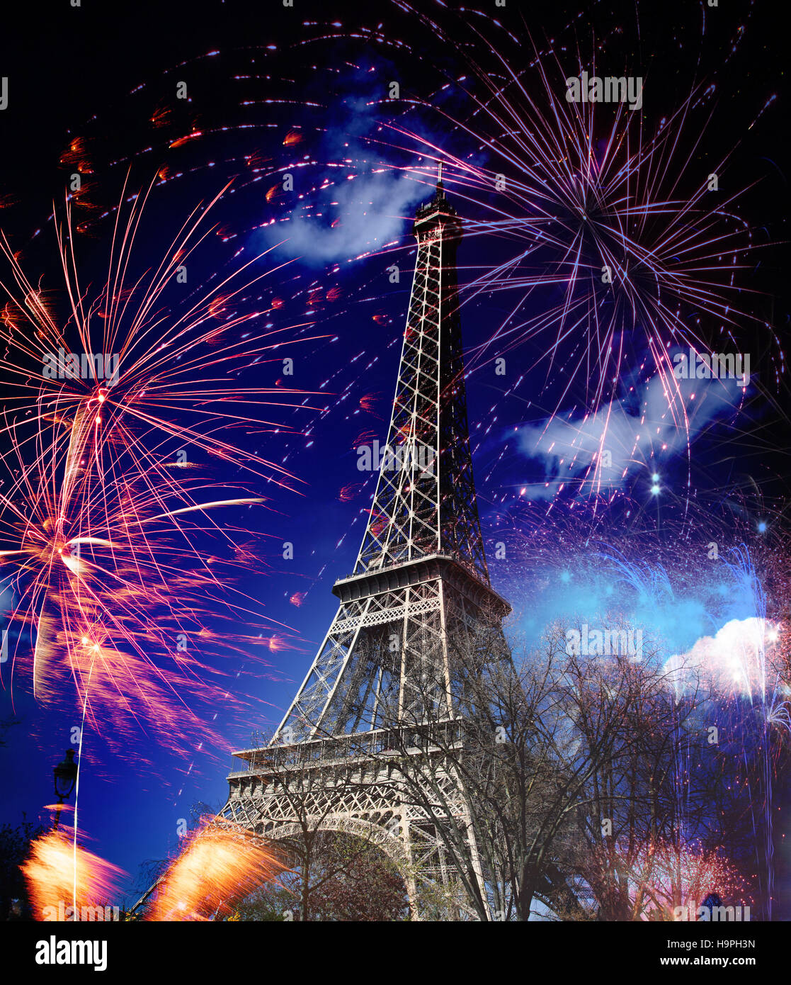 Eiffel tower with fireworks, celebration of the New Year in Paris
