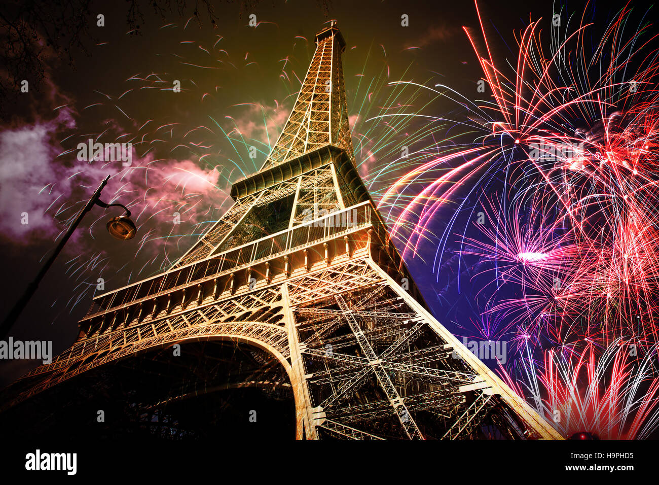 Eiffel tower with fireworks, celebration of the New Year in Paris