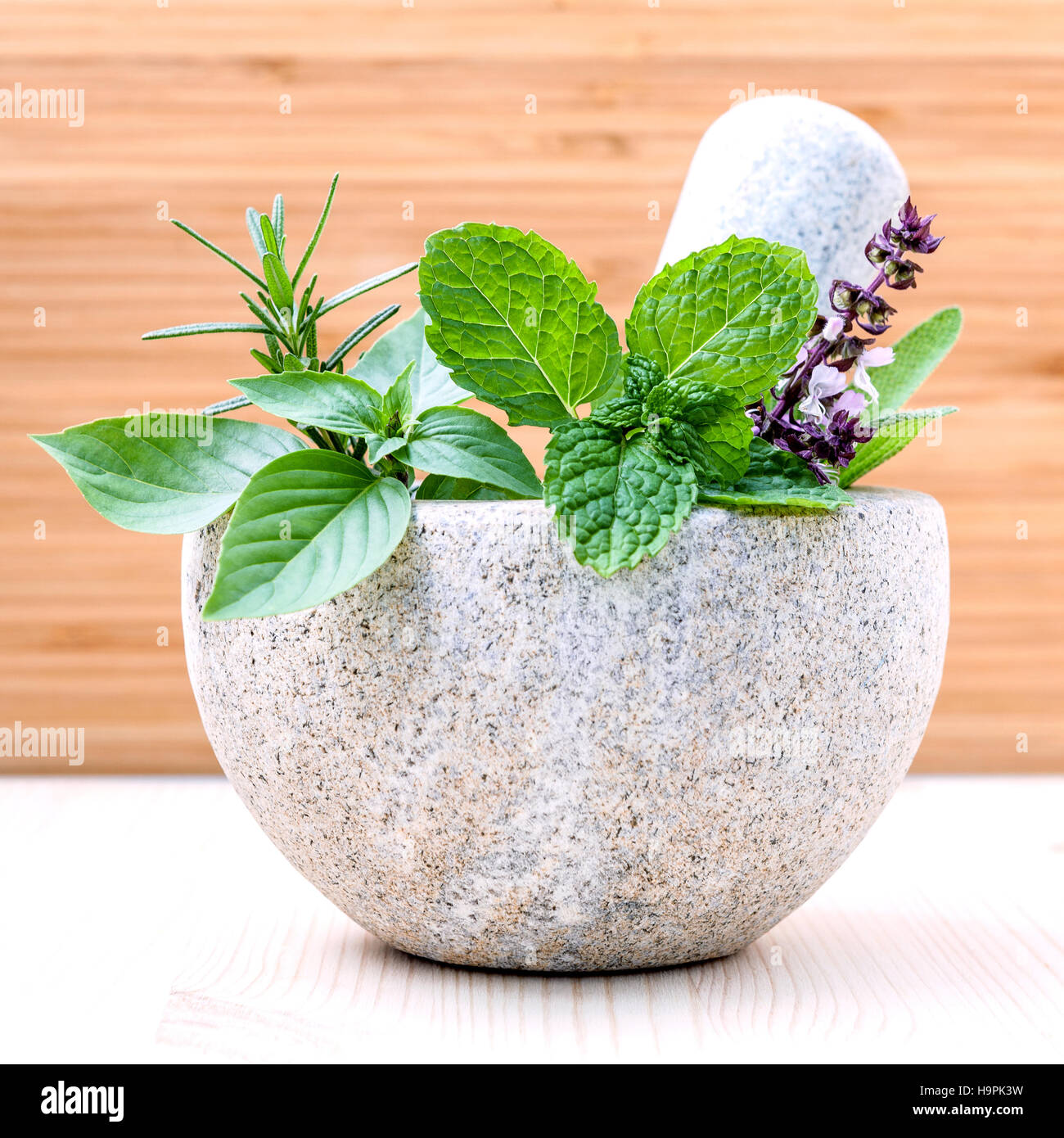 Alternative health care fresh herbs basil ,sage ,rosemary and mi Stock