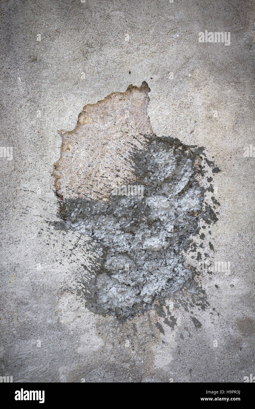Hole in the wall filled with concrete patch Stock Photo Alamy