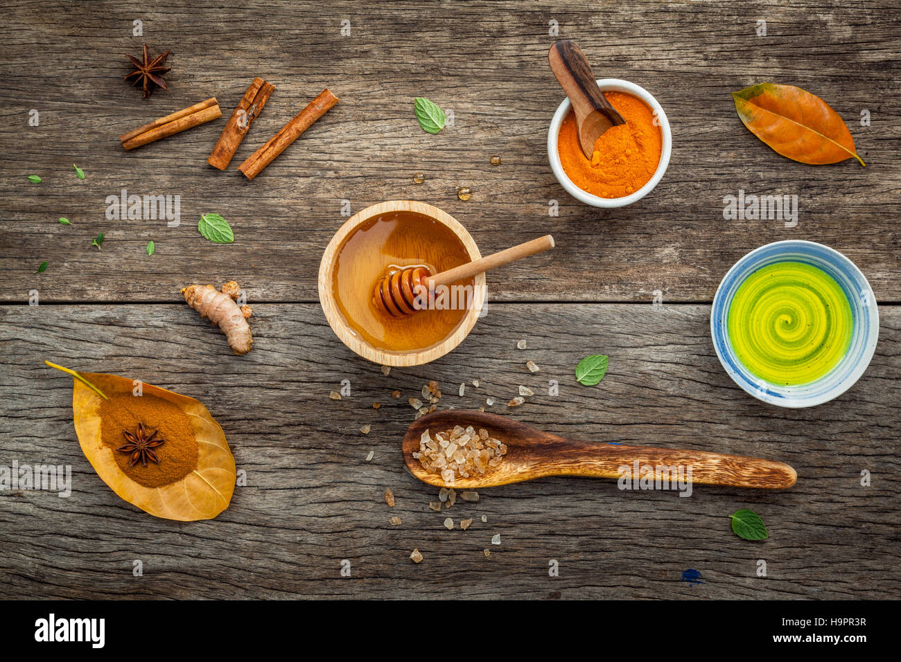 Composition of nature spa ingredients on the dark wooden table. Stock Photo
