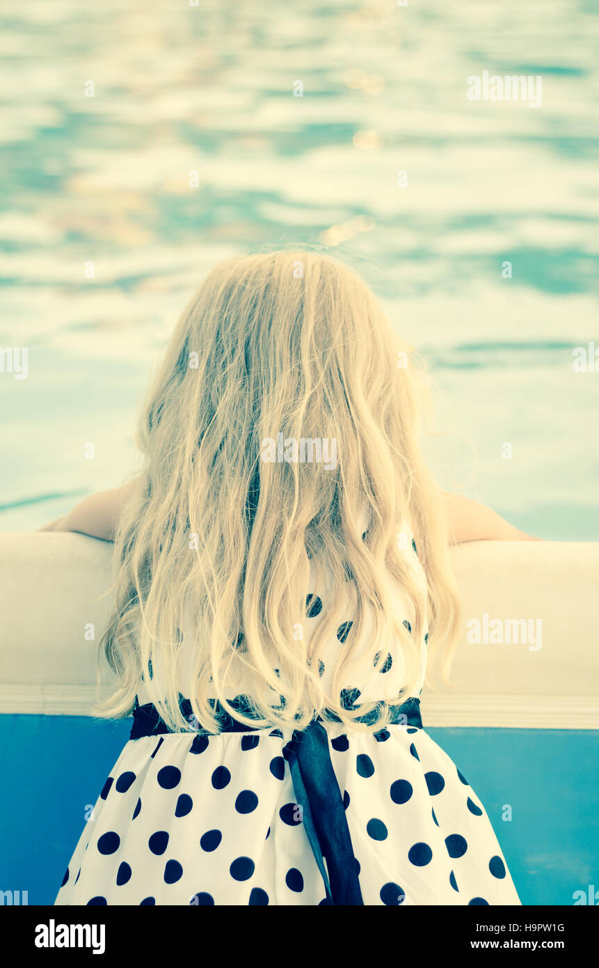 little girl with long blond hair back view Stock Photo - Alamy