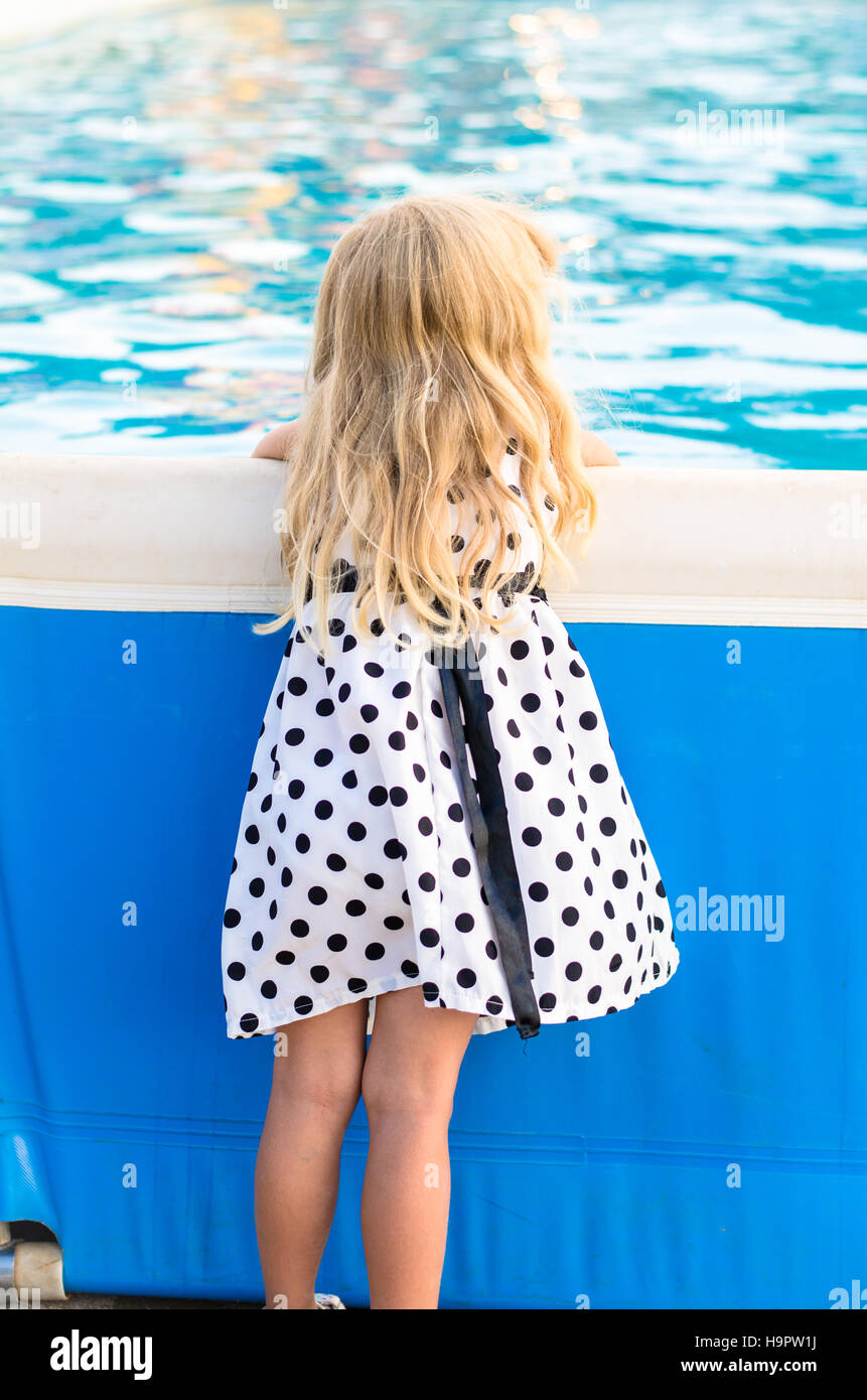 little girl with long blond hair back view Stock Photo - Alamy