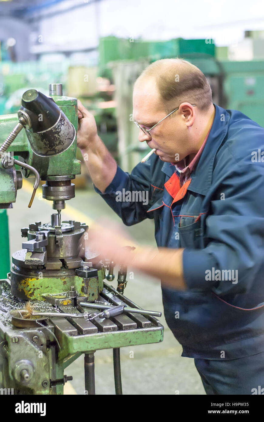 Milling machine operator smoking Stock Photo Alamy