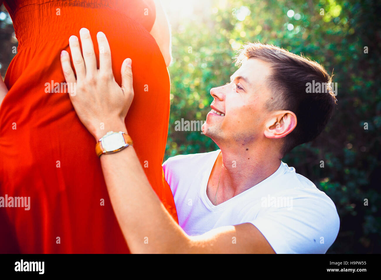 husband tenderly cares for his pregnant wife Stock Photo - Alamy