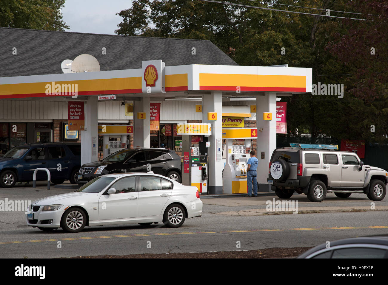 Gas station in Connecticut USA Motorists at a filling station in the